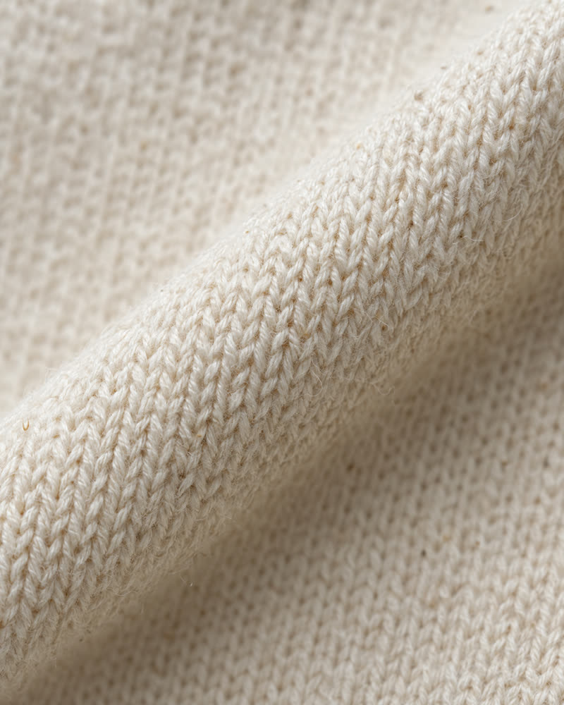 Macro of ecru organic cotton single jersey